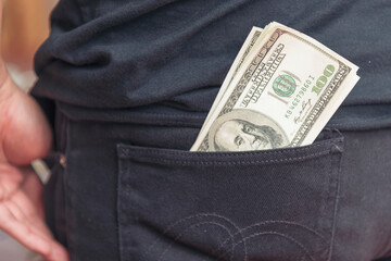 Hand holding loan money dollar bank note give financial payment. Man hands showing spread 100 dollar exchange cash payout. Saving Businessman counting money banknote  bribe corruption concept.