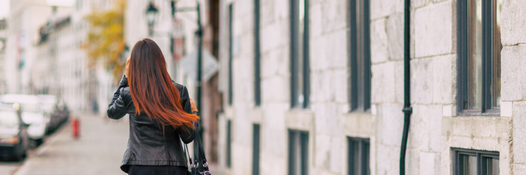 Ombre hair coloring woman walking with colered end of hair with lighter brown tone. Urban city lifestyle young people with dyed hairstyle.