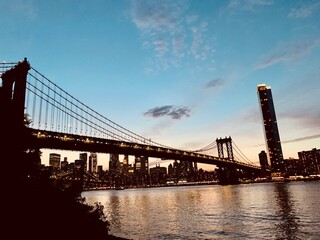 Fototapeta na wymiar Manhattan Bridge at sunset looking over the New York City Skyline