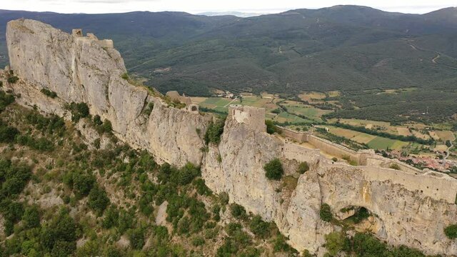 Aerial view of historic Castle ruin Peyrepertuse in the Aude in France. High quality 4k footage