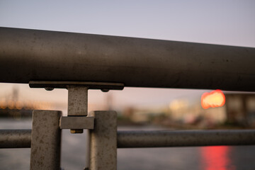 Fence Railing with blurred cityscape background