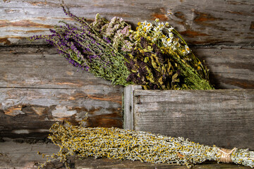 The season for collecting medicinal plants. Healing dried herbs and flowers in bouquets. Herbal medicine. Retro toned.