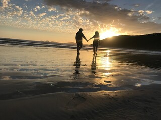 couple at beach at sunset