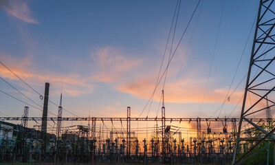 High voltage power lines a summer. Thermal power plant. High-voltage transformer substation.