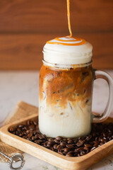 Iced Latte coffee in a glass with caramel