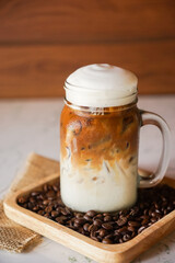 Iced Latte coffee in a glass with caramel