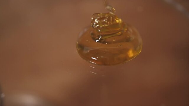 pouring honey on honey slow motion 4k