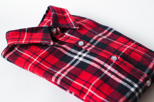 red plaid shirt on white bachground