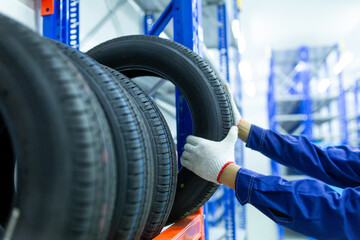 New tires that change tires in the auto repair service center in the stock blur for the industry, a four-wheeled tire set at a warehouse © tong2530