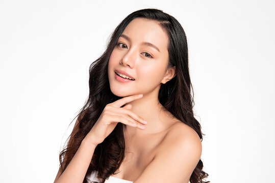 Beautiful Young asian Woman with Clean Fresh Skin, on white background, Face care, Facial treatment, Cosmetology, beauty and spa, Asian women portrait