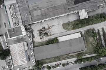 aerial top view of the roofs of a warehouse buildings in an industrial estate