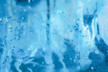 Textured ice blue frozen rink winter background