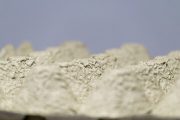 Recyclable grey carton egg tray cardboard or paper packaging.