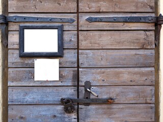 The door is closed. The padlock is closed. Copy space. Mockup.