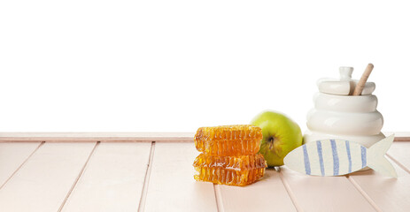 Composition for Rosh Hashanah (Jewish New Year) celebration on table against white background