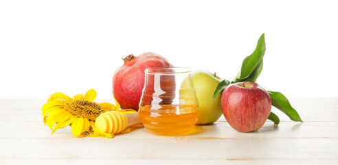 Composition for Rosh Hashanah (Jewish New Year) celebration on table against white background