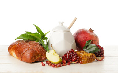 Composition for Rosh Hashanah (Jewish New Year) celebration on table against white background