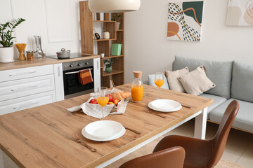 Interior of modern stylish kitchen with dining table