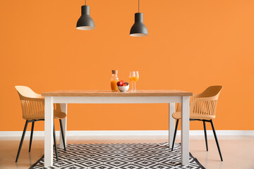 Dining table near color wall