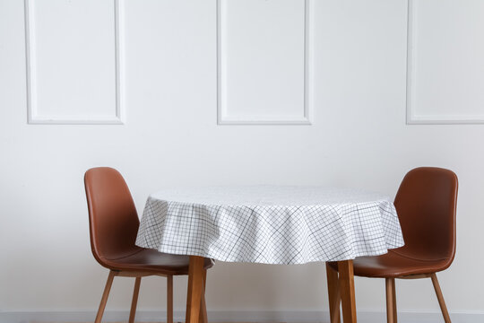 Dining Table Near White Wall