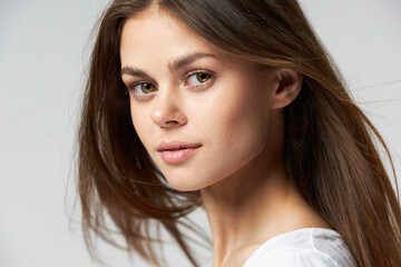 Naklejka premium Woman portrait attractive look long hair close-up 