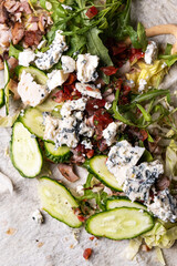 Lavash with vegetables, chicken and cheese close-up.