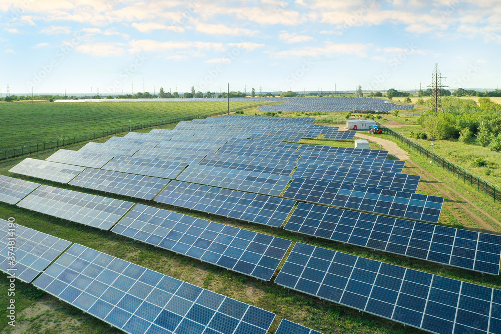 Wall mural solar panels installed outdoors, aerial view. alternative energy source