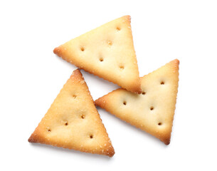 Delicious crispy crackers isolated on white, top view