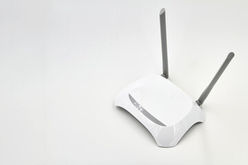 White wireless router on light background. Close-up