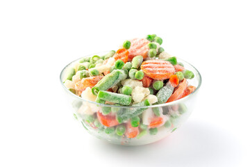 Glass bowl with frozen vegetables isolated on white, green peas, carrot, cauliflower,  green beans