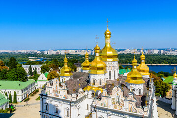 Fototapeta na wymiar View on Dormition Cathedral of the Kiev Pechersk Lavra, river Dnieper and Kiev cityscape