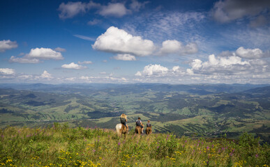 Horseback riding in the Carpathian mountains.