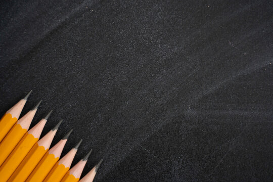 Pens on the background of blackboard. Back to school