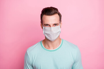 Close-up portrait of his he nice attractive healthy man wearing safety mask contamination preventive measures symptom syndrome diagnosis isolated over pink pastel color background
