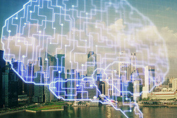 Brain hologram drawing on cityscape background multi exposure. Ai in modern city concept.
