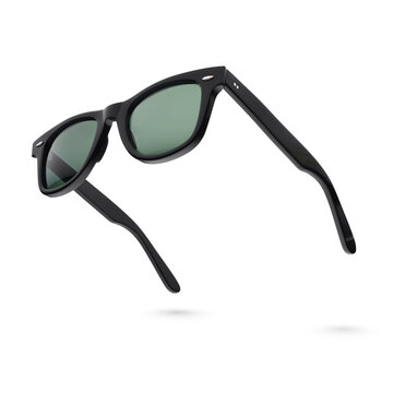 Black plastic sunglasses isolated on white.