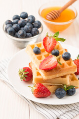 Belgian waffles for breakfast. Dessert food concept. 