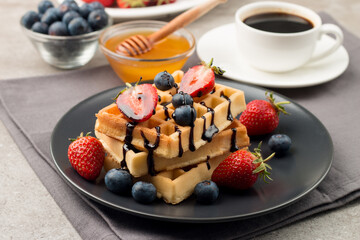 Belgian waffles for breakfast. Dessert food concept. 