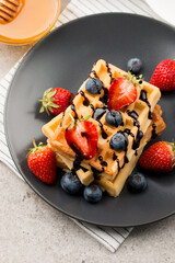 Belgian waffles for breakfast. Dessert food concept. 