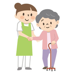 杖をついた高齢者女性を介助する若い女性介護士