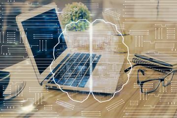 Double exposure of desktop with computer and brain drawing hologram. Artificial intelligence concept.