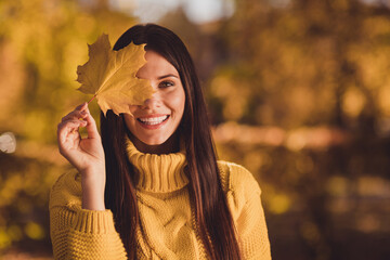 Close up photo of positive cheerful girl enjoy autumn travel fall woodland trip close cover eyes...
