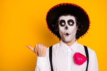 Close-up portrait of his he nice handsome amazed stunned wondered guy wear festal outfit demonstrating copy space advice recommend advert ad isolated bright vivid shine vibrant yellow color background