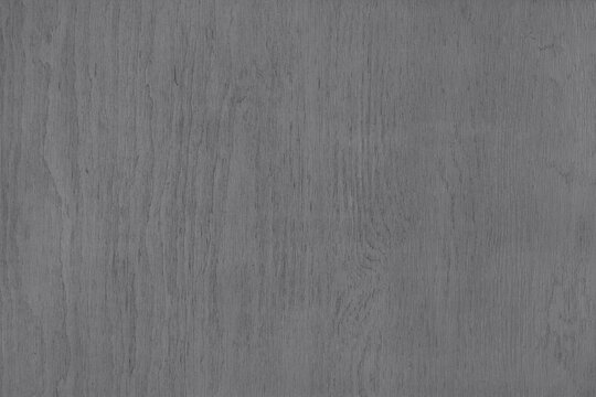 Gray color painted plywood surface texture. Wooden table, top view. Grey wood desk background