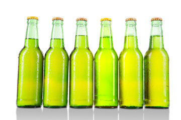 Close up of a row unopened bottles of cold beer