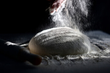 Fresh raw dough for bread or pizza. Selestive focus