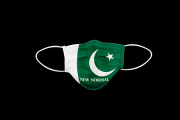 New normal text on mask with flag of Pakistan