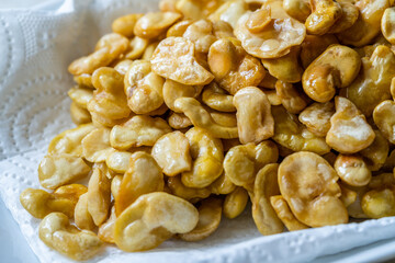 Homemade Fried Salty Roasted Fava Broad Beans Chips. Healthy Organic Snacks. Portuguese Style with Garlic.