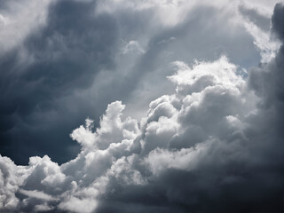 Storm clouds gathered, the sunlight shone through and gave them texture mood and atmosphere, ready for lightning and thunder to erupt. An image you can stare at for hours looking at the detail, best v