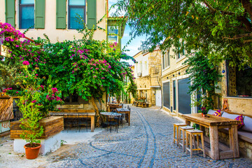 Alacati street view in Alacati Town. Alacati is populer historical tourist destination in Turkey. - obrazy, fototapety, plakaty